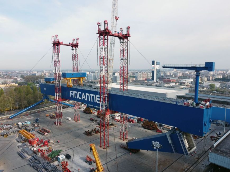 Assembly of a 800 ton capacity Goliath Crane by means of SPMTs, Towerlift and Strand Jacking system